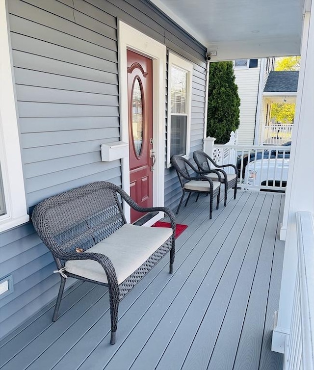 15 Bates Rd, Framingham, MA 01702 - wooden terrace featuring covered porch