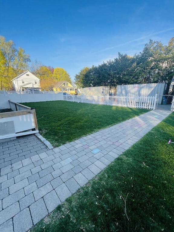 15 Bates Rd, Framingham, MA 01702 - view of yard featuring fence private yard and a patio