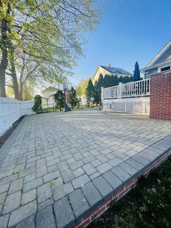 15 Bates Rd, Framingham, MA 01702 - exterior space featuring a deck and fence