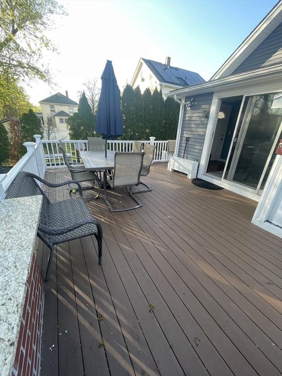 15 Bates Rd, Framingham, MA 01702 - wooden deck featuring outdoor dining space