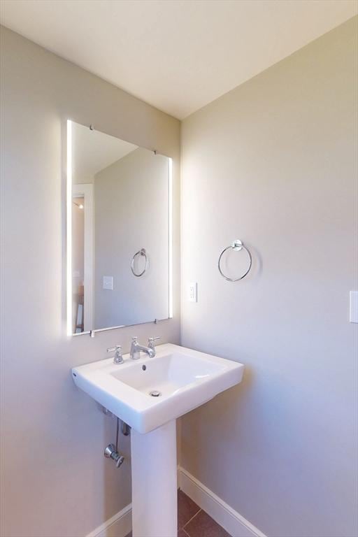 bathroom featuring baseboards