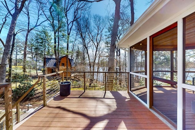 wooden terrace with a sunroom