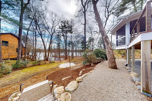view of yard featuring a sunroom