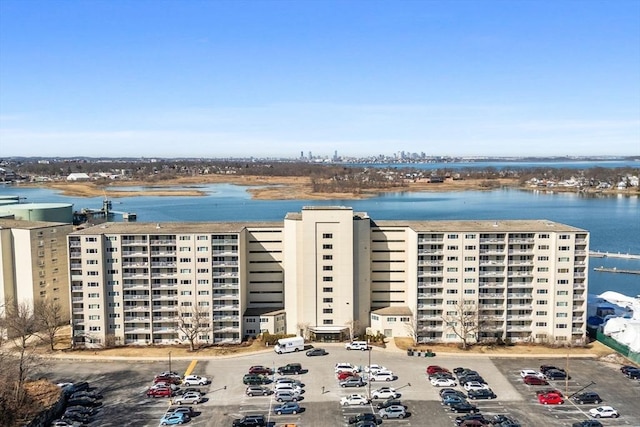 bird's eye view featuring a water view and a view of city