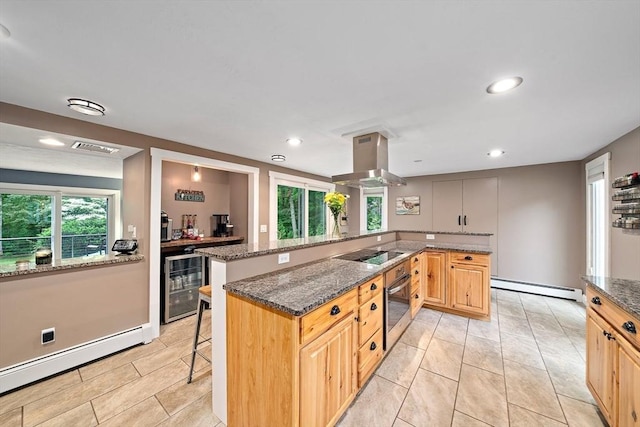 28-R Pammys Path, Easton, MA 02356 - kitchen with a baseboard heating unit, oven, island range hood, beverage cooler, and recessed lighting