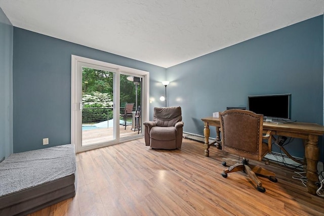 28-R Pammys Path, Easton, MA 02356 - office area with a baseboard radiator and wood finished floors