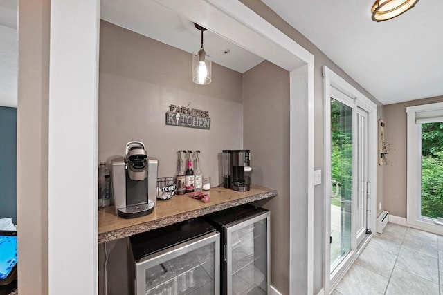 28-R Pammys Path, Easton, MA 02356 - indoor dry bar featuring beverage cooler, a baseboard radiator, light tile patterned flooring, and pendant lighting