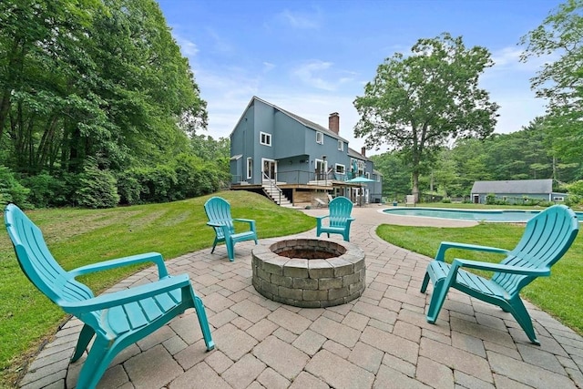 28-R Pammys Path, Easton, MA 02356 - view of patio / terrace with an outdoor fire pit, an outdoor pool, a deck, and stairway