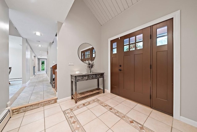 28-R Pammys Path, Easton, MA 02356 - entrance foyer featuring a baseboard heating unit, lofted ceiling, light tile patterned flooring, baseboard heating, and wooden ceiling