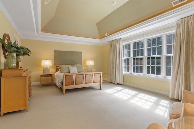 bedroom with visible vents, crown molding, baseboards, a tray ceiling, and light carpet