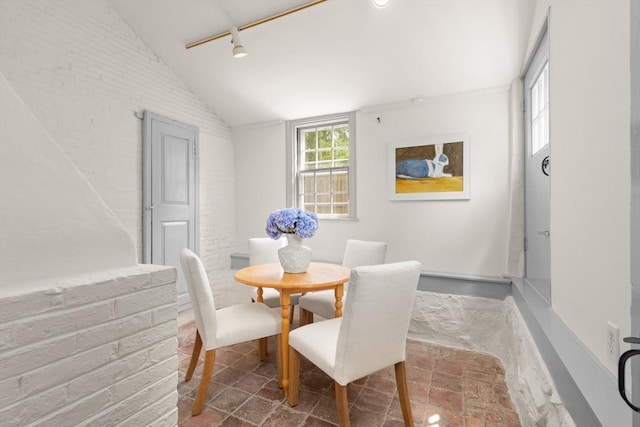 120 Court St, Dedham, MA 02026 - dining area featuring vaulted ceiling and track lighting