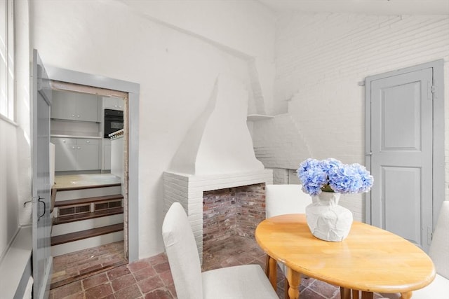 120 Court St, Dedham, MA 02026 - dining space with stone finish floors and stairway
