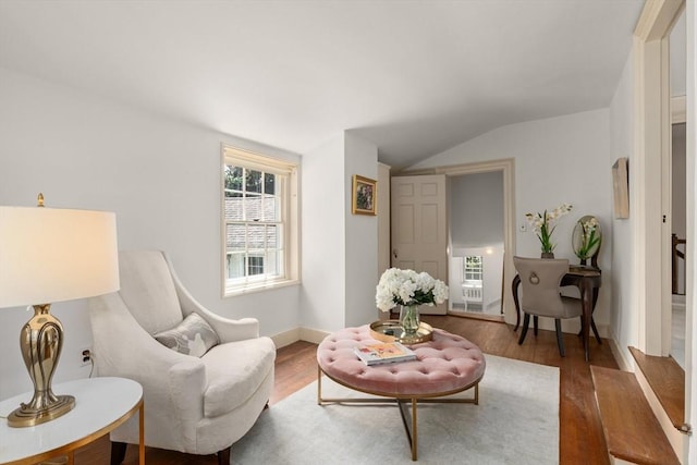 120 Court St, Dedham, MA 02026 - sitting room featuring vaulted ceiling and wood finished floors