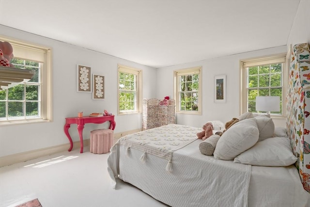120 Court St, Dedham, MA 02026 - carpeted bedroom featuring baseboards