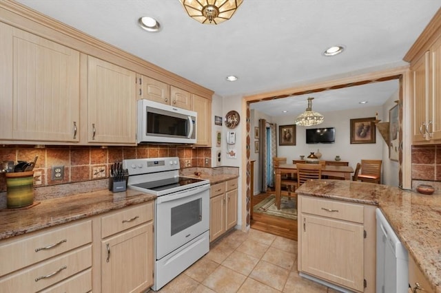 1100 Salem St Unit 103, Lynnfield, MA 01940 - kitchen featuring white appliances, light brown cabinetry, light tile patterned floors, tasteful backsplash, and recessed lighting