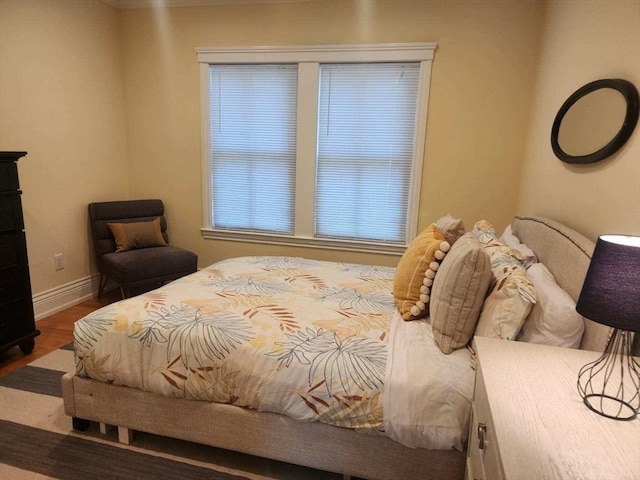 bedroom featuring hardwood / wood-style flooring