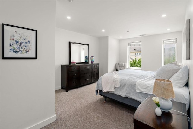 99 Chestnut Hill Ave Unit 212, Boston, MA 02135 - bedroom with recessed lighting, light carpet, and baseboards