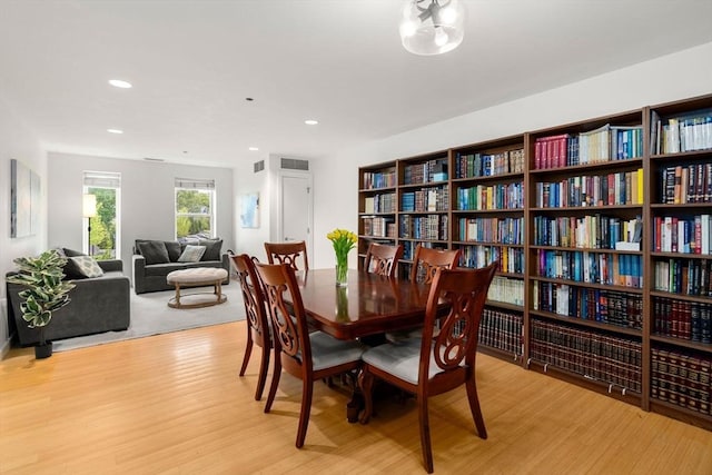 99 Chestnut Hill Ave Unit 212, Boston, MA 02135 - dining area with light wood finished floors and recessed lighting