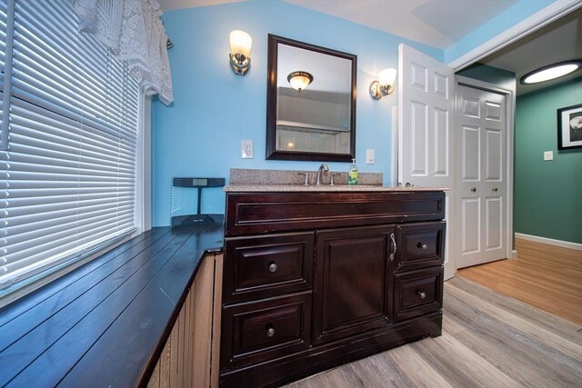 1286 Locust St, Fall River, MA 02723 - bathroom with vanity and wood finished floors