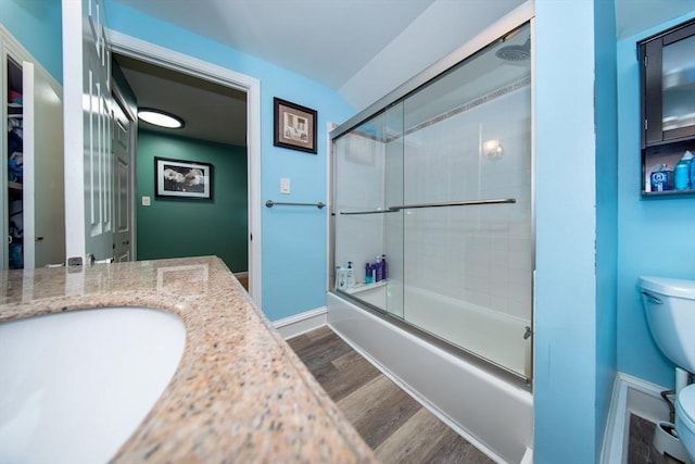 1286 Locust St, Fall River, MA 02723 - full bath featuring toilet, wood finished floors, shower / bath combination with glass door, and vanity