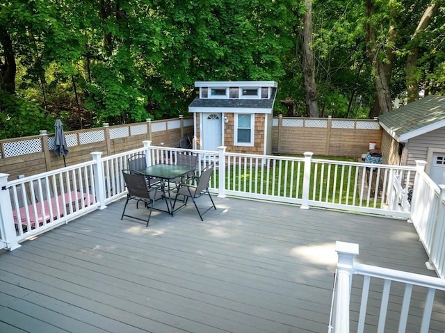 1286 Locust St, Fall River, MA 02723 - wooden terrace featuring outdoor dining space