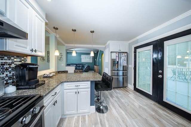 1286 Locust St, Fall River, MA 02723 - kitchen featuring stainless steel refrigerator with ice dispenser, wall chimney exhaust hood, french doors, a peninsula, and white cabinets