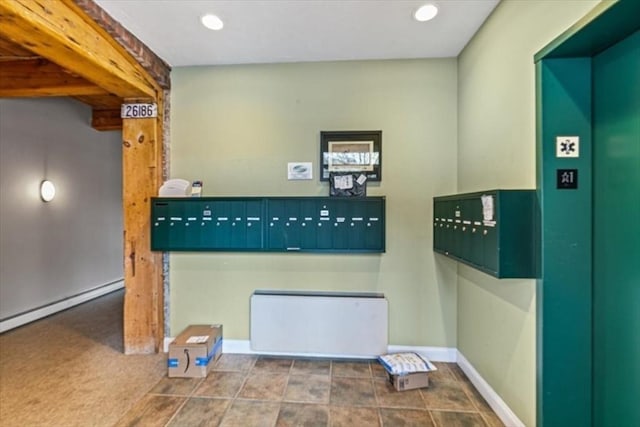 detailed view of baseboards, recessed lighting, and elevator