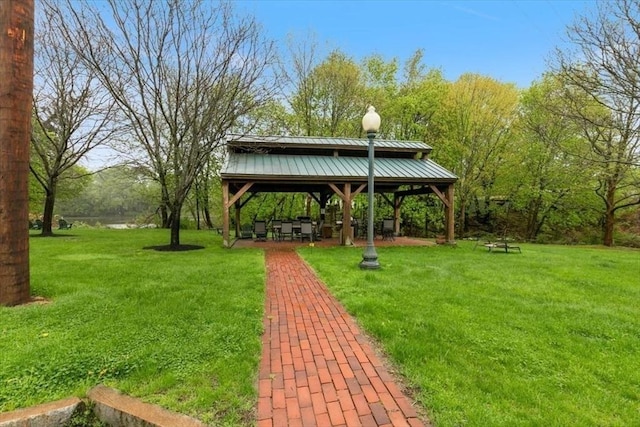view of community featuring a gazebo and a lawn