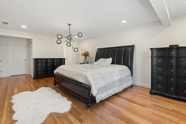 bedroom with recessed lighting, baseboards, visible vents, and wood finished floors