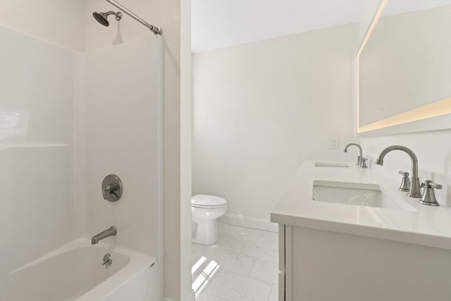 full bathroom featuring  shower combination, a sink, marble finish floor, and toilet