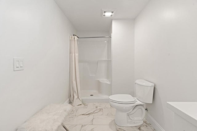 full bathroom with baseboards, marble finish floor, toilet, and a shower with curtain