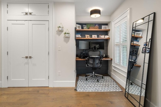 654 E 7th Unit 3, Boston, MA 02127 - home office with baseboards and wood finished floors