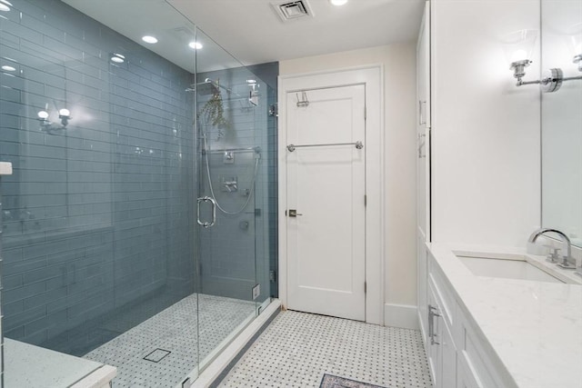 654 E 7th Unit 3, Boston, MA 02127 - full bath featuring tile patterned floors, a shower stall, vanity, recessed lighting, and baseboards