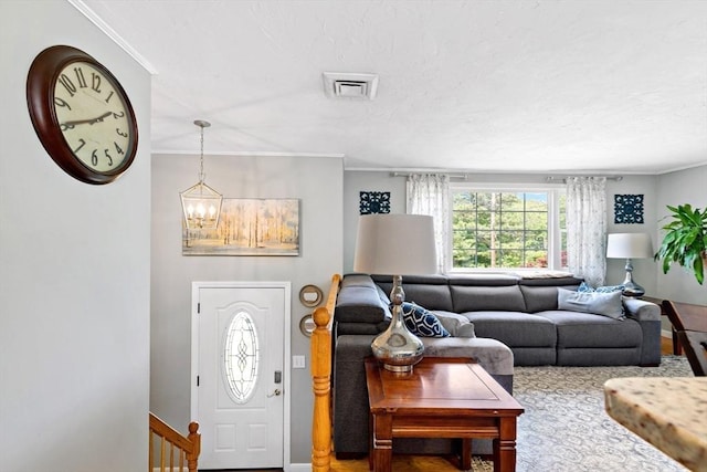 4 Jester Way, Plymouth, MA 02360 - living area with a chandelier and crown molding