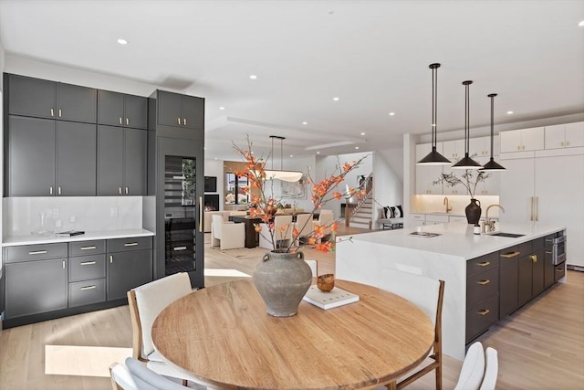 48 Sherburne Rd, Lexington, MA 02421 - dining area with light wood-style flooring and recessed lighting