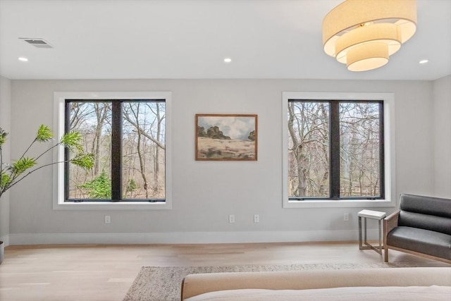48 Sherburne Rd, Lexington, MA 02421 - sitting room with wood finished floors, baseboards, and recessed lighting
