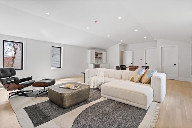 48 Sherburne Rd, Lexington, MA 02421 - living area with lofted ceiling, light wood-type flooring, and recessed lighting