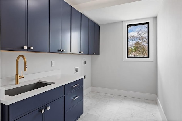 48 Sherburne Rd, Lexington, MA 02421 - washroom featuring cabinet space, electric dryer hookup, light marble finish flooring, hookup for a washing machine, and baseboards