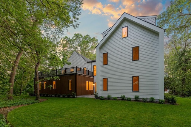 48 Sherburne Rd, Lexington, MA 02421 - rear view of house featuring a lawn and a balcony