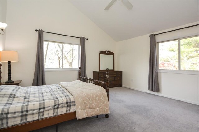 bedroom featuring baseboards, carpet flooring, a ceiling fan, and lofted ceiling