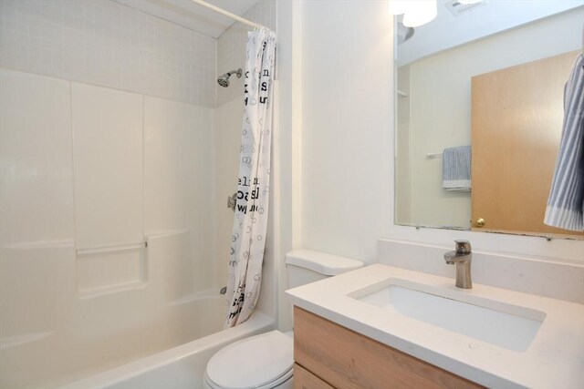 bathroom featuring vanity, shower / bathtub combination with curtain, visible vents, and toilet