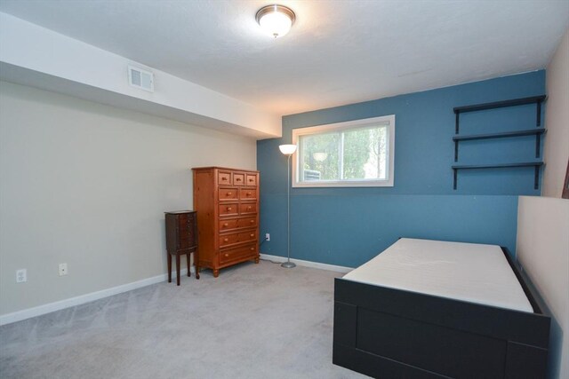 bedroom with carpet flooring, baseboards, and visible vents