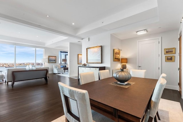 dining space with wood finished floors, baseboards, and recessed lighting