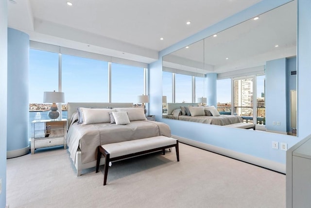 bedroom featuring light colored carpet and recessed lighting