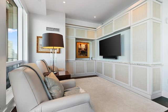 living area with recessed lighting