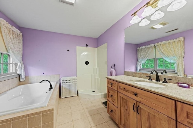 311 River Rd, South Hadley, MA 01075 - bathroom featuring a bath, heating unit, walk in shower, vanity, and tile patterned flooring