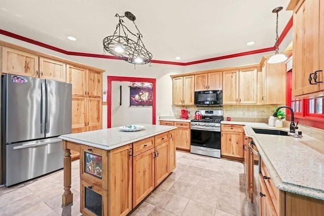 311 River Rd, South Hadley, MA 01075 - kitchen with appliances with stainless steel finishes, a sink, light brown cabinets, crown molding, and recessed lighting
