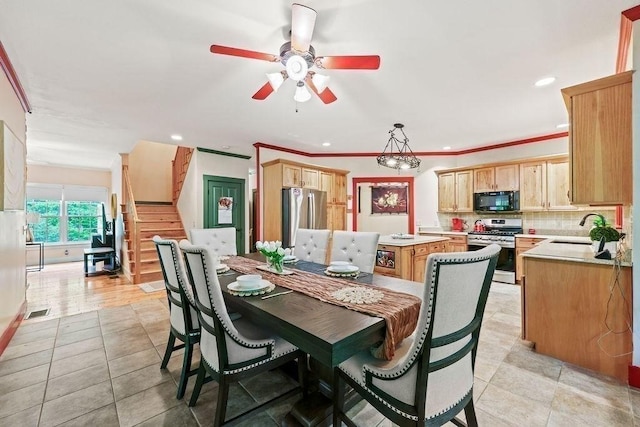 311 River Rd, South Hadley, MA 01075 - dining space with a ceiling fan, light tile patterned flooring, recessed lighting, stairway, and crown molding