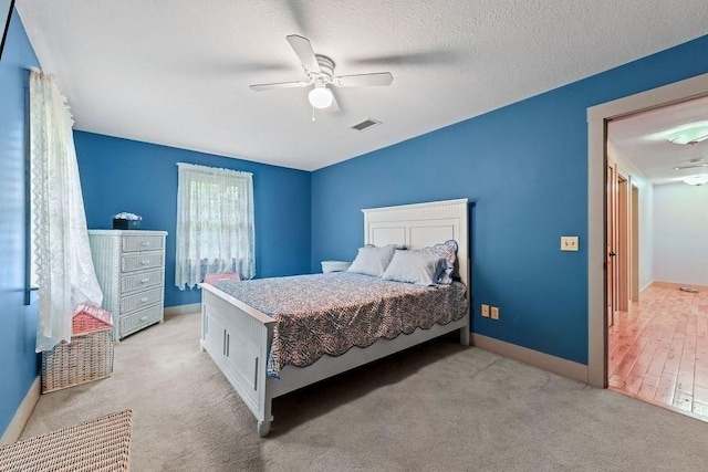 311 River Rd, South Hadley, MA 01075 - bedroom featuring light colored carpet, a ceiling fan, and baseboards