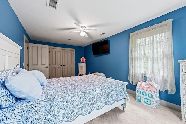 311 River Rd, South Hadley, MA 01075 - carpeted bedroom with a closet, baseboards, and ceiling fan